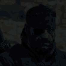 a close up of a man wearing sunglasses and a bandage around his eye
