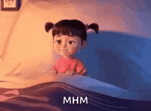 a cartoon girl is sitting in a bed with the words `` mhm '' written above her .