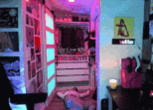 a person is laying on the floor in a room with a purple light behind them