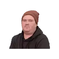 a man wearing a brown beanie and a black hoodie is looking at the camera .