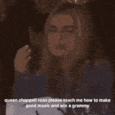 a woman with red hair stands in front of a microphone with the words no grammy for you chopison rae above her