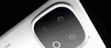 a close up of a camera on a white phone