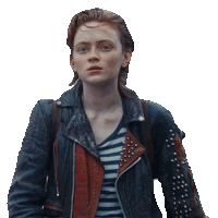 a woman in a striped shirt and a leather jacket