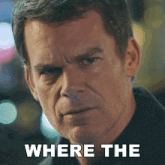 a close up of a man 's face with the words " where the " above him