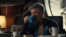 Spitting Coffee Overseer Benjamin GIF - Spitting Coffee Overseer Benjamin Fallout GIFs