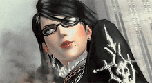 a close up of a woman wearing glasses and a black jacket with a skull on it