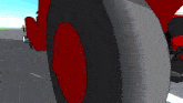 a cartoon drawing of a red truck with a red tire