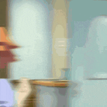 a blurry drawing of a person 's face with a purple shirt on