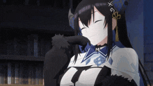 a girl with long black hair and a crown with the letter m on it