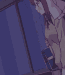 a girl in a school uniform is standing in front of a window at night .