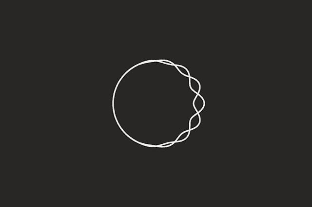 a white circle with a black background is being drawn on a black background .