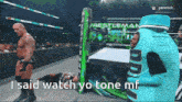 a wrestling match is being shown on peacock and the words i said watch yo tone mf are visible