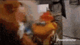 a blurred image of a person with the words power director at the bottom of the image