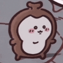 a cartoon drawing of a monkey with a smiley face on its face