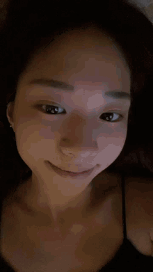 a close up of a woman 's face without makeup