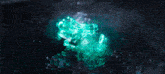 a green glowing object with a few letters on it