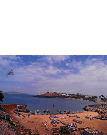 a large body of water with a few boats in it and a sign that says ' aerial view ' on it