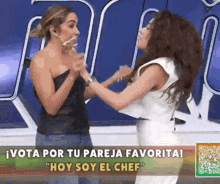 a couple of women standing next to each other with the words hoy soy el chef in the corner .