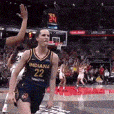a basketball player wearing a jersey that says indiana 22 on it