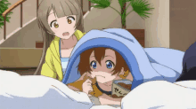 two anime girls are looking at a child under a blanket with a can of food in the background