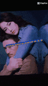 a woman hugging a man with the words assalamualaikum wr.i.b written on it