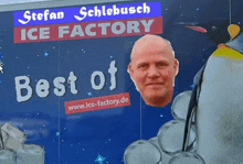 a sign for stefan schlebusch ice factory has a bald man 's head on ice cubes