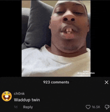 a man laying on a couch with 923 comments and a reply from waddup twin