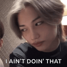 a close up of a person with the words " i ain 't doin ' that "