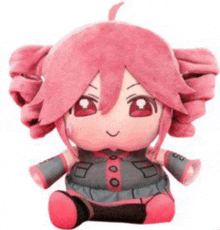 a stuffed toy of a girl with pink hair and red eyes is sitting on a white surface .