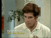 a man in a white shirt says falha nossa