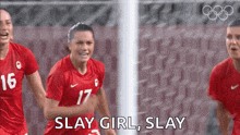 a group of soccer players are running on a field and one of them is saying `` slay girl , slay ''