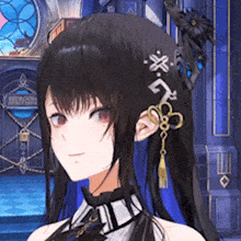 a close up of a girl 's face with a key in her hair .