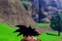 a video game character , goku , is standing in a field with a mountain in the background .