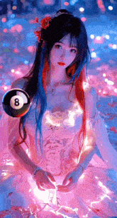 a girl in a pink dress is holding a pool ball with the number 8 on it