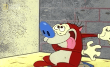 a cartoon character with a blue nose is sitting in a corner