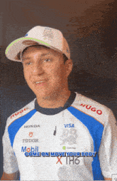 a man wearing a shirt that says honda tudor and mobil