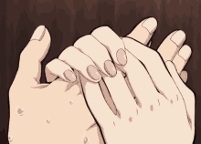 a close up of a person 's hands with their fingers crossed