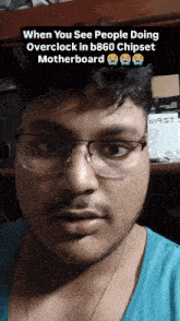 a man wearing glasses and a blue shirt with the caption when you see people doing overclock in b860 chipset motherboard