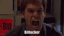 a man is screaming and the word bitlocker is on the bottom of his face