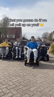 a group of people in wheelchairs are riding down a brick road with the caption what you gonna do if we all pull up on you