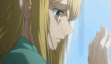 a girl with long blonde hair is crying and looking out a window