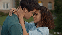 a man and a woman looking into each other 's eyes with netflix written on the bottom