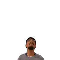 a man with glasses and a beard is looking up at the number 32