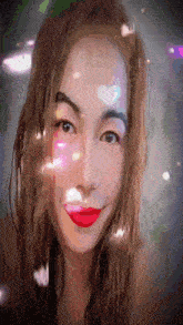 a close up of a woman with red lipstick on her lips