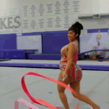 Performing With A Ribbon Cardi B GIF - Performing With A Ribbon Cardi B Gymnastic Ribbon Practice GIFs