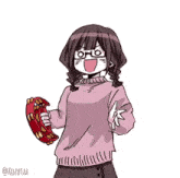 a girl in a pink sweater is holding a tambourine .