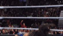 a wrestling match is being broadcast live on wwe