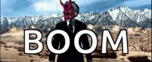 a man in a suit with a red mask stands in front of mountains and the word boom
