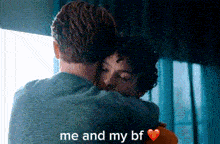 a man and a woman hugging each other with the words `` me and my bf '' written on the bottom .