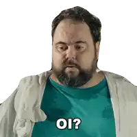 a man with a beard is wearing a blue shirt that says oi